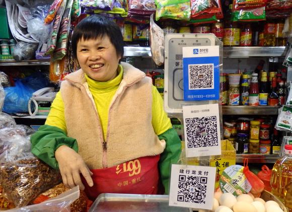 http://asia.nikkei.com/Business/AC/China-s-Tencent-grabs-830m-mobile-payment-users